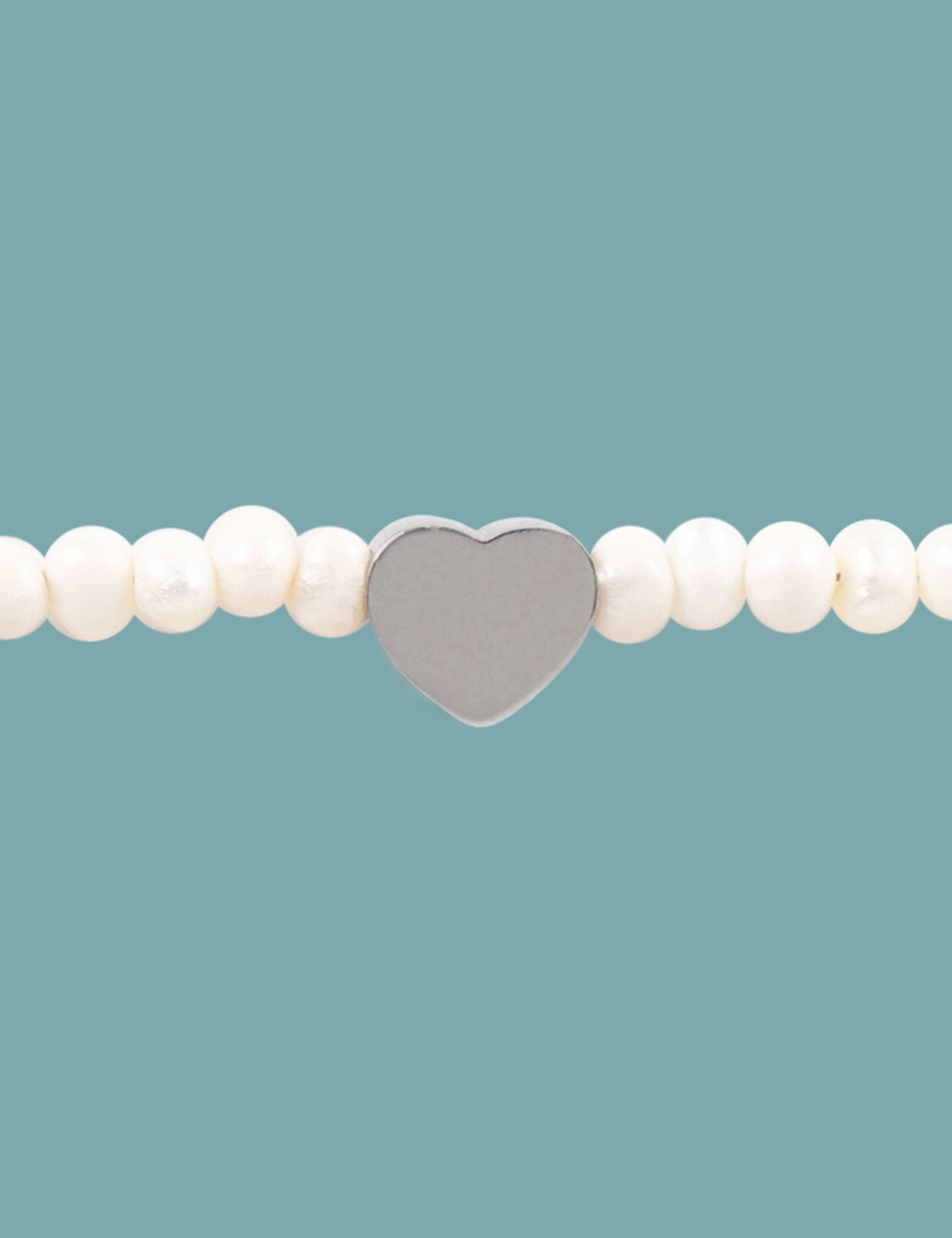 Pulsera handmade  Corazón/ Perla de río + Acero inoxidable + Hilo macramé