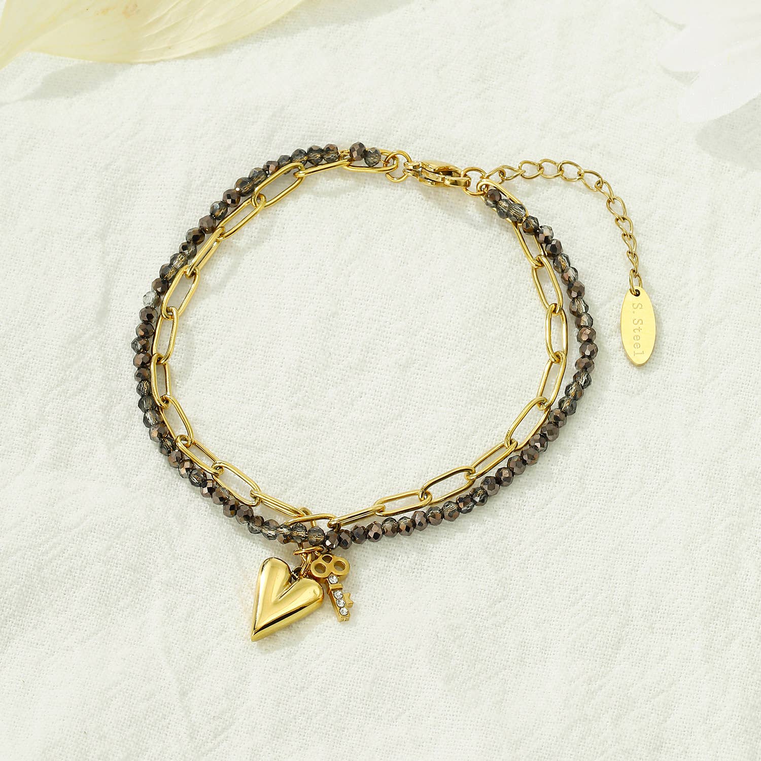 Pulsera de cristales y corazón de acero inoxidable