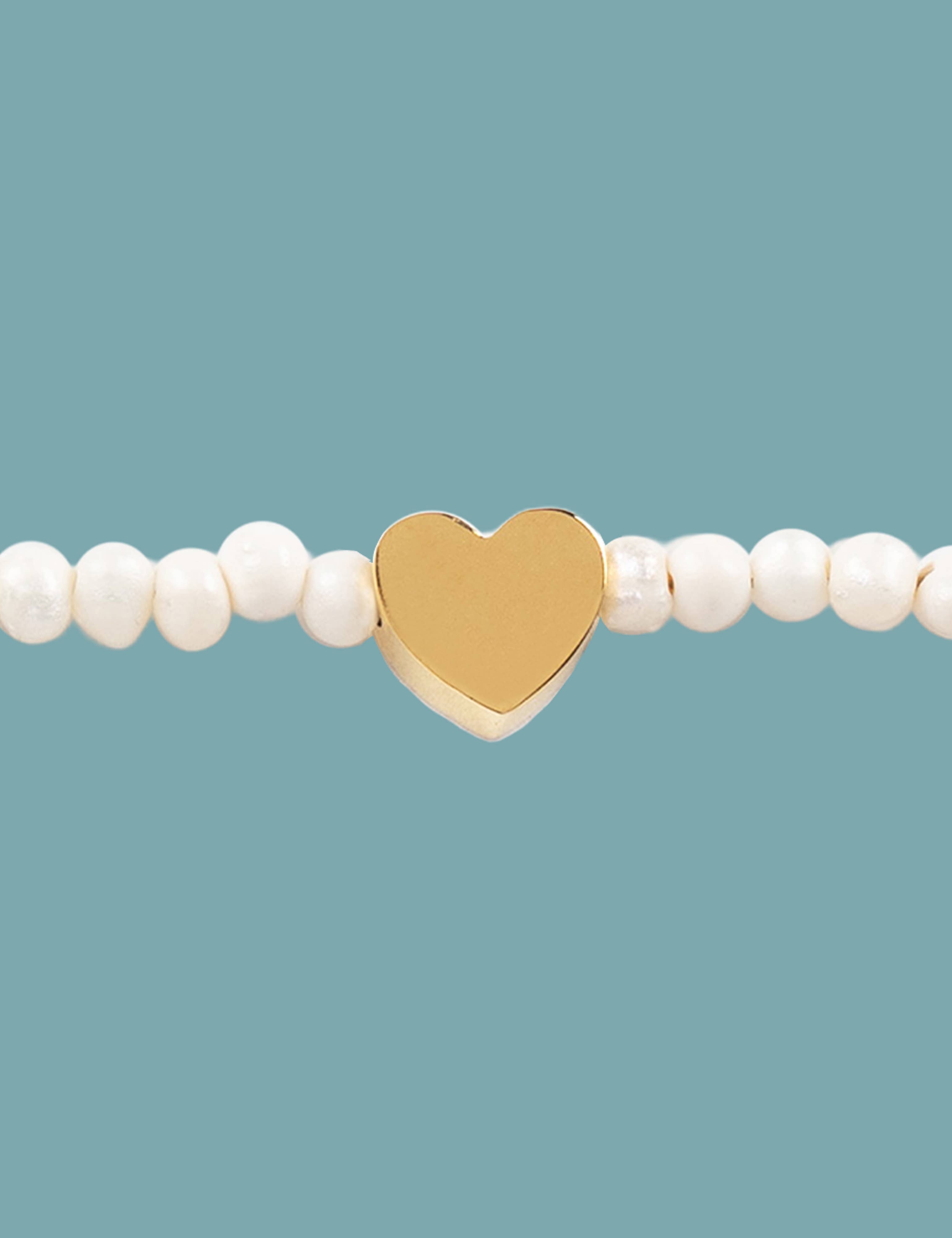 Pulsera handmade  Corazón/ Perla de río + Acero inoxidable + Hilo macramé