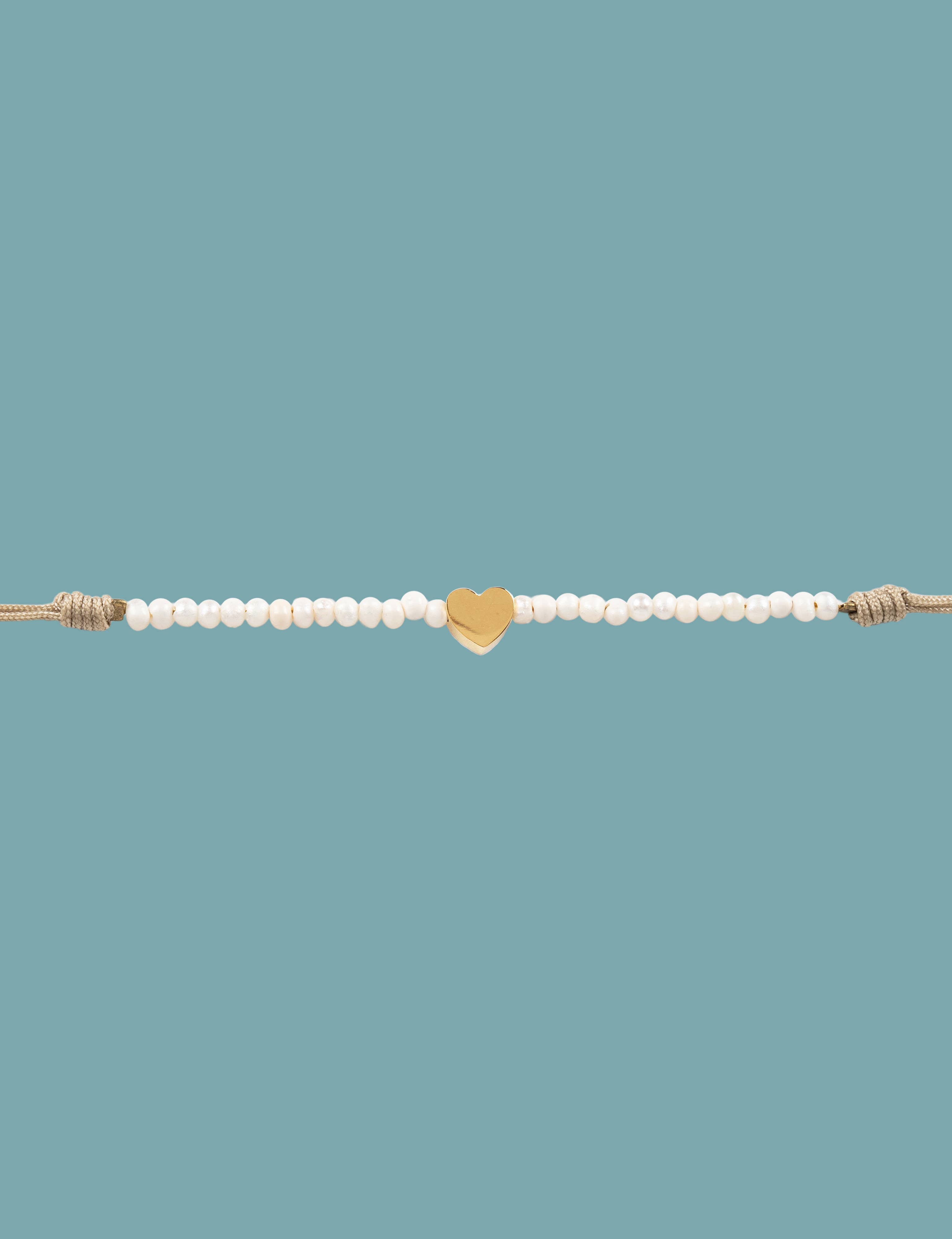 Pulsera handmade  Corazón/ Perla de río + Acero inoxidable + Hilo macramé